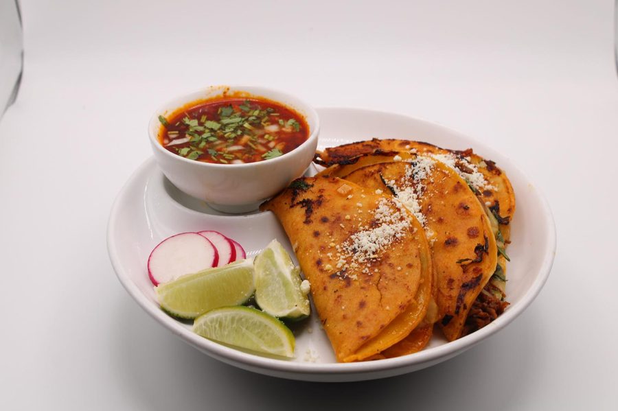 Birria tacos with consommé